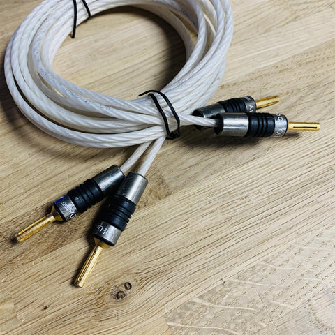 QED Silver Special 25th Anniversary Edition Speaker Cables 2.5m (pair) fitted with QED Airloc Banana Connectors