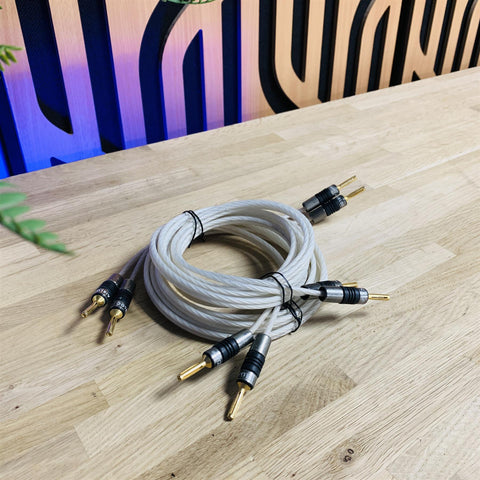 QED Silver Special 25th Anniversary Edition Speaker Cables 2.5m (pair) fitted with QED Airloc Banana Connectors